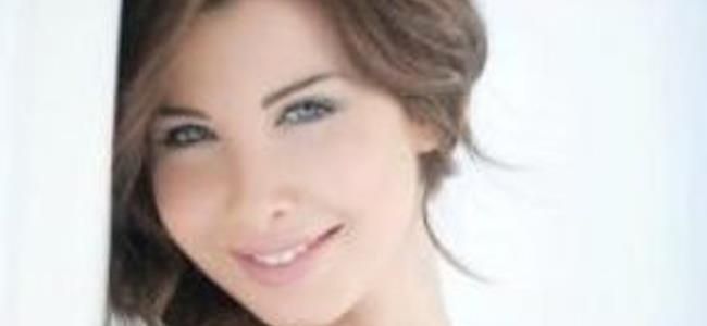 نانسي: رسالتي زرع البسمة بين الناس