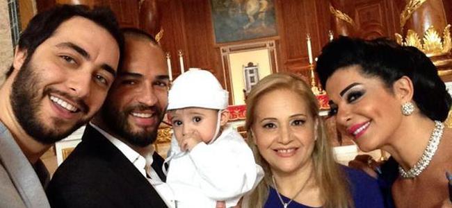 وسام حنا ينشر صور معمودية شربل ابن عادل كرم