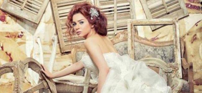 بالصور.. مي عزالدين عروس من جديد!