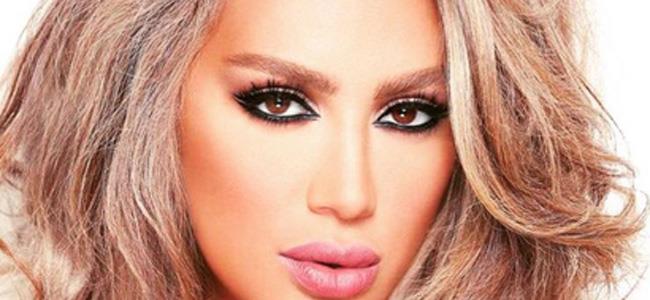 بالصورة مايا دياب تتحدى ثلوج فاريا بفستانها القصير