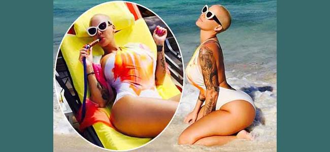 آمبر روز تُدخن الأركيلة على البحر