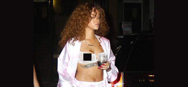 بالصور: ريهانا تتنزه بحمالة الصدر! 