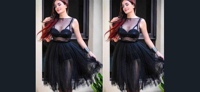 بالصورة: فستان دومينيك حوراني يشعل مواقع التواصل الاجتماعي