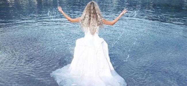 ما قصة فستان مايا دياب الأبيض