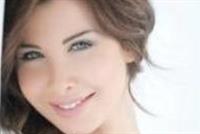 نانسي: رسالتي زرع البسمة بين الناس