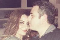 بالصورة.. هيلدا خليفة وقبلة رومانسية من زوجها في احد ملاهي بيروت