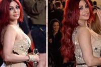 بالصورة - أحمد الفيشاوي يمسك بمؤخرة هيفاء وهبي