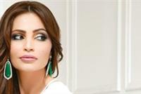 هكذا ردت زوجة راغب علامة على إليسا