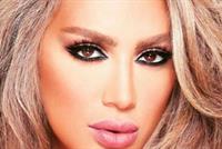 بالصورة مايا دياب تتحدى ثلوج فاريا بفستانها القصير