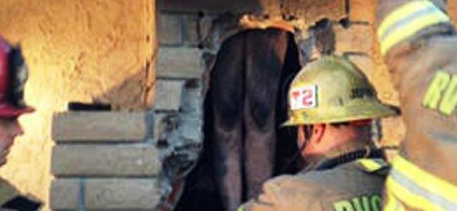 مرأة عارية علقت في مدفأة منزل زوجها والسبب