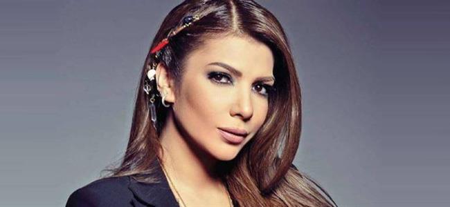 أصالة تكشف حقيقة ديانتها