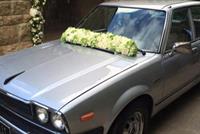 يمنى تدخل القفص الذهبي بسيارة الرئيس بشير الجميّل