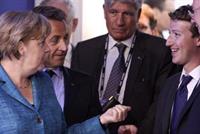  ميركل تحرج زوكربيرغ بسبب العنصرية في 