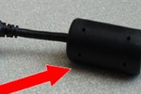 ما سر القطعة البلاستيكية الموجودة على أسلاك شحن الكومبيوتر؟