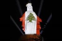 إضاءة تمثال العذراء بألوان العلم اللبناني على نية شفاء المرضى